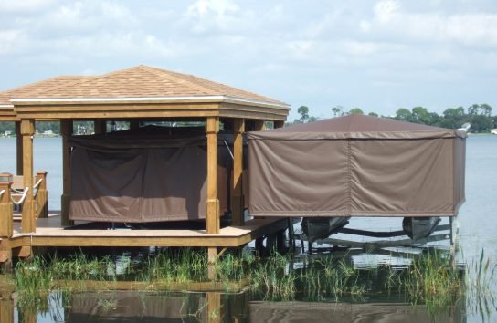 side by side, two touchless boat covers