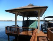 Automatic Boat Cover in a boat house on a Florida Lake